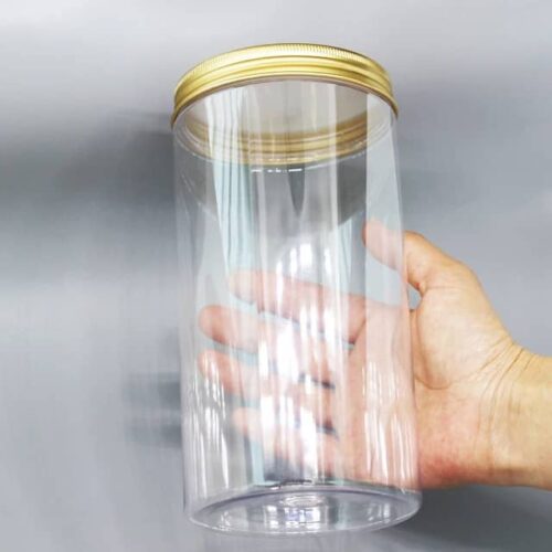 CLEAR CONTAINER WITH GOLD COLOURED LID 1KG
